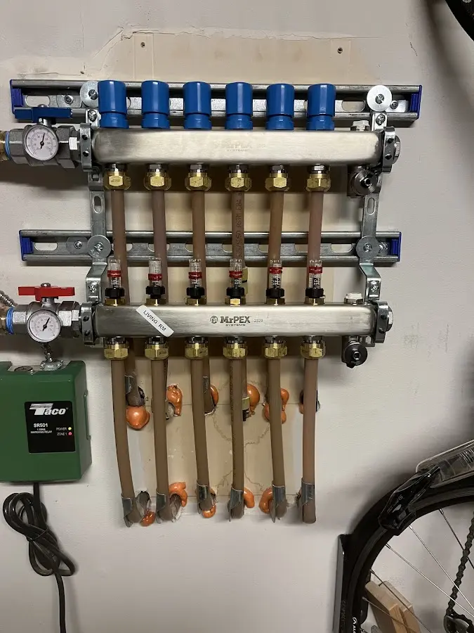 Plumber performing Gas Line Installation at a residential property in Leroy